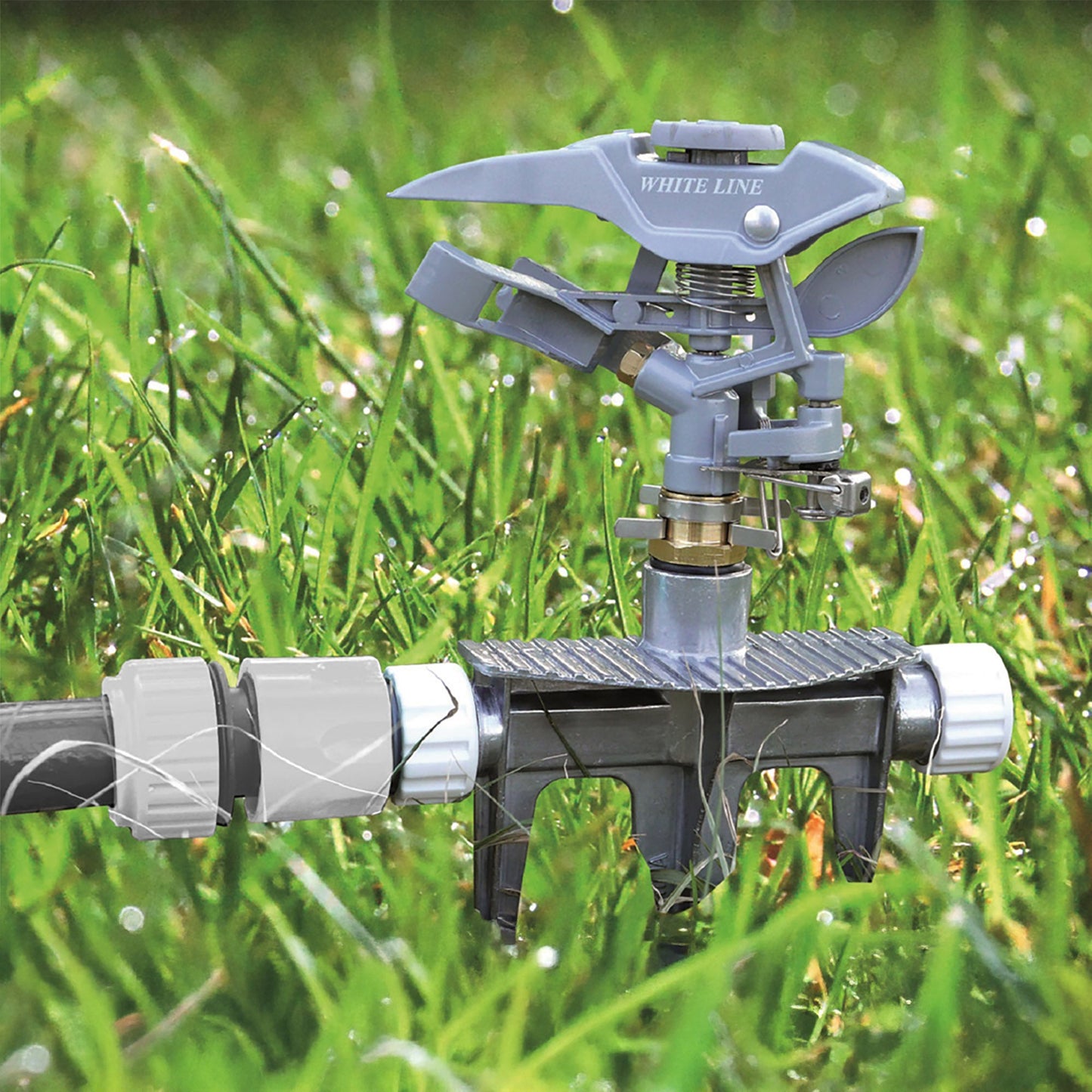 Triton Pulsating Lawn Sprinkler, White line